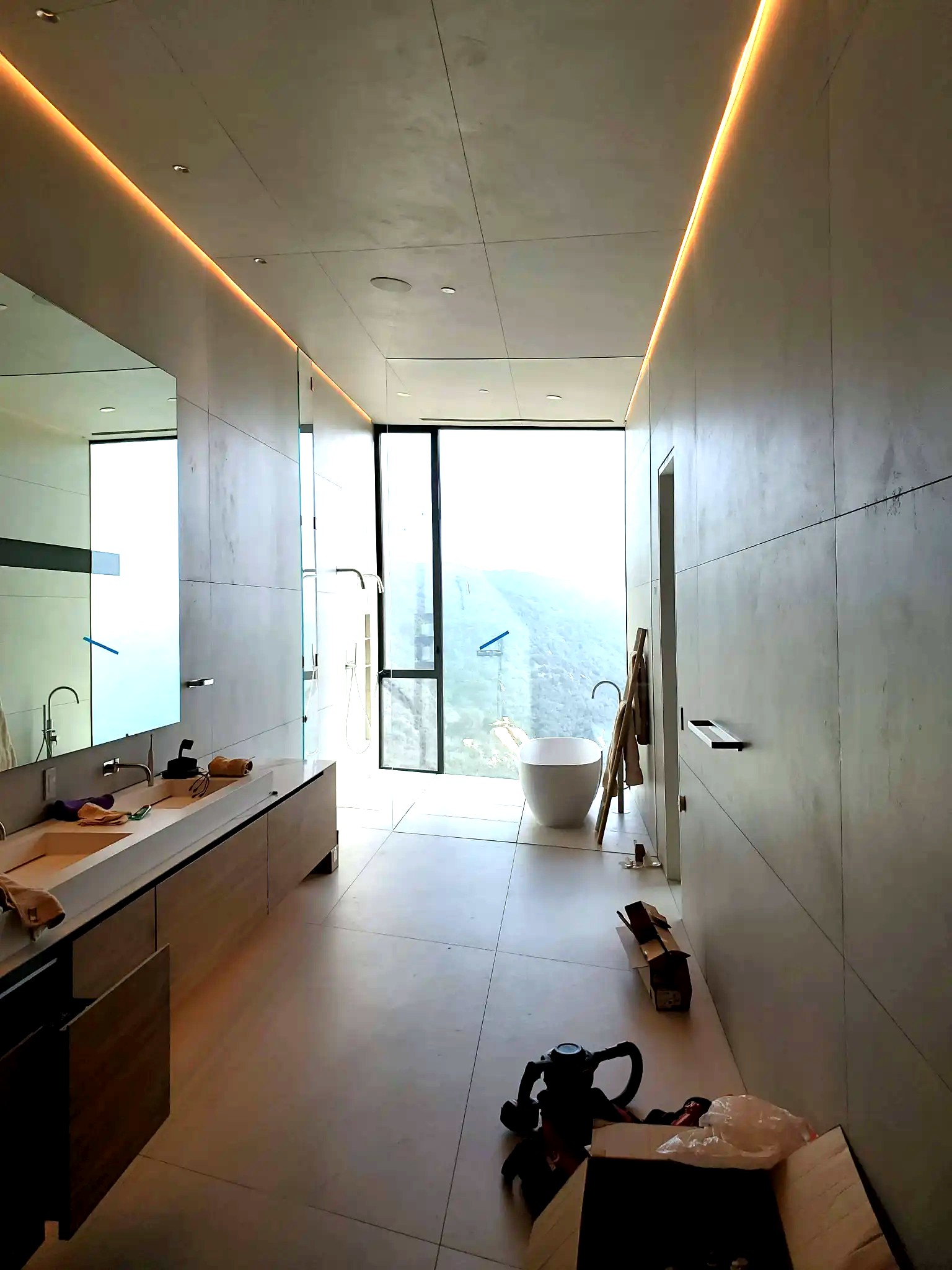 Master bathroom Dekton tile installation across walls and ceiling at the Piedra Morada Residence in Pacific Palisades