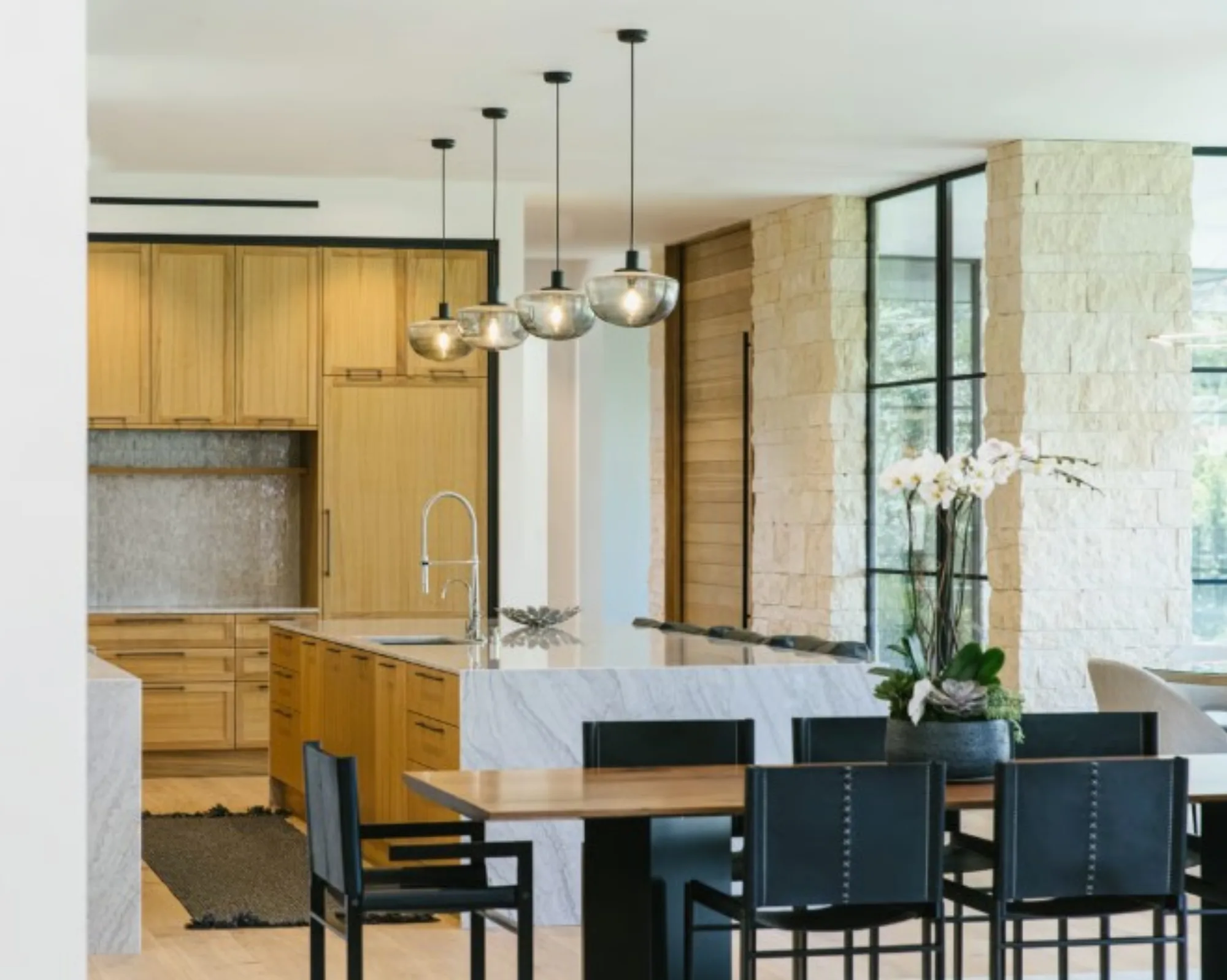 Kitchen island with marble waterfall edges at the Lombard Estate in Pacific Palisades, fabricated and installed by CAD Stone Works